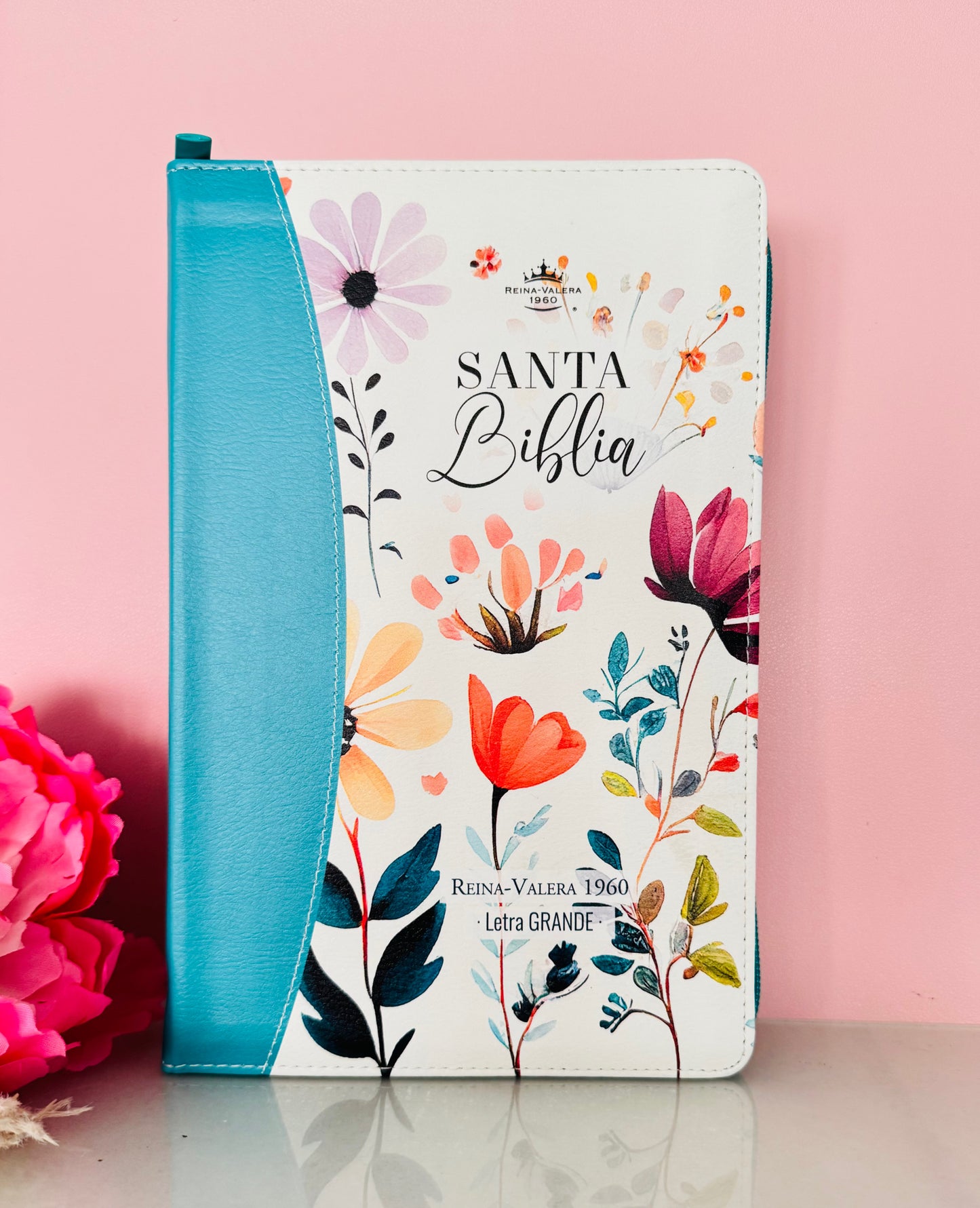 Biblia con cierre color turquesa